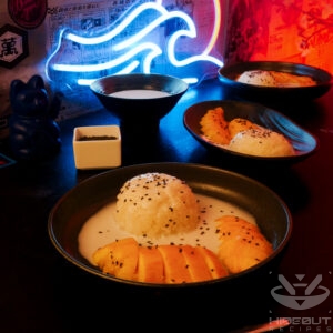 A futuristic Cyberpunk-style food photo showing multiple plates of Thai Mango Sticky Rice.