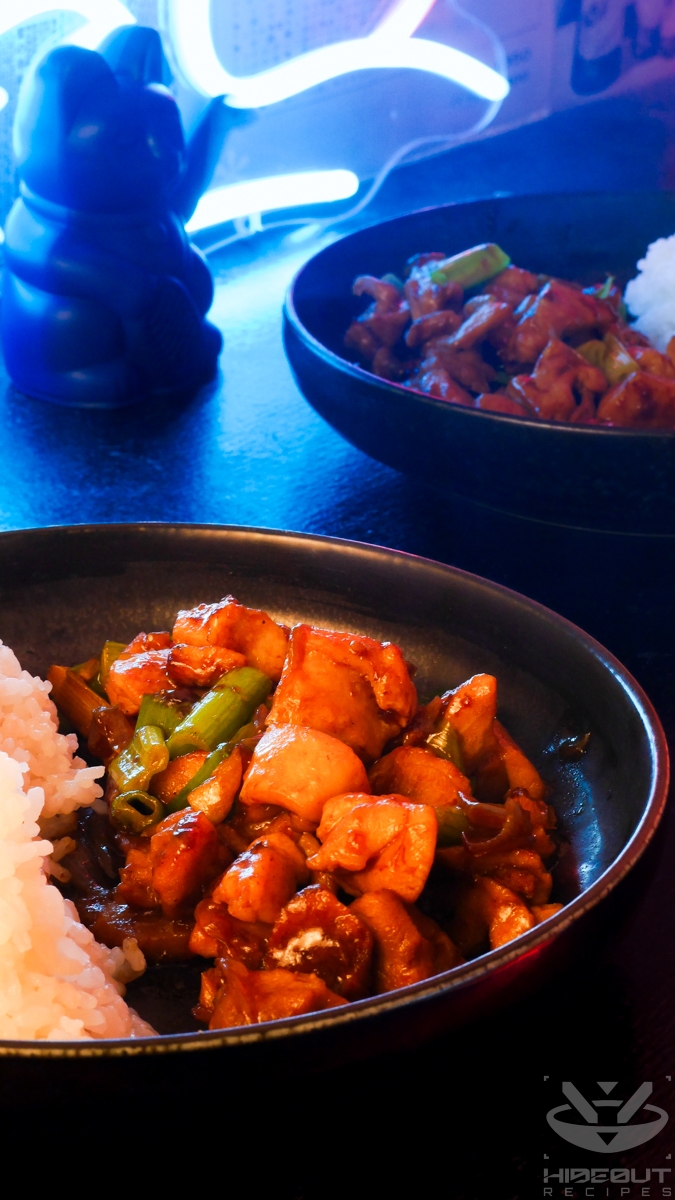A futuristic Cyberpunk-style food photo. A plate of Ginger Chicken and rice is at the center, with another plate in the back.