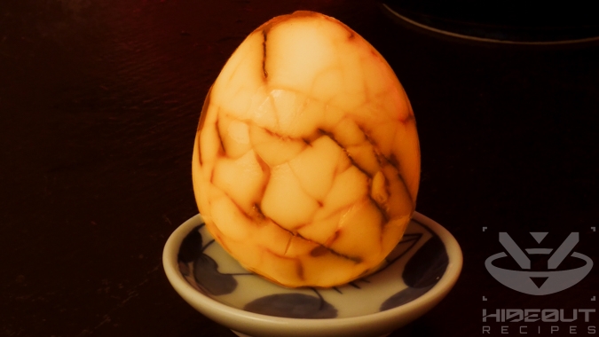 A Chinese Tea Egg on a small plate.