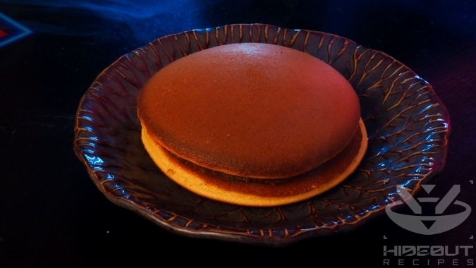 A futuristic Cyberpunk-style photo showing a Dorayaki (Japanese red bean pancake).