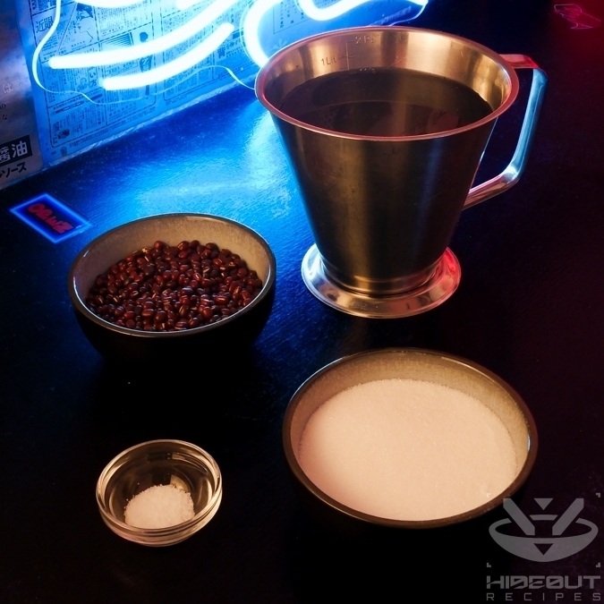 Pre-measured ingredients for sweet red bean paste are standing on a table: adzuki beans, sugar, water, and a pinch of salt.